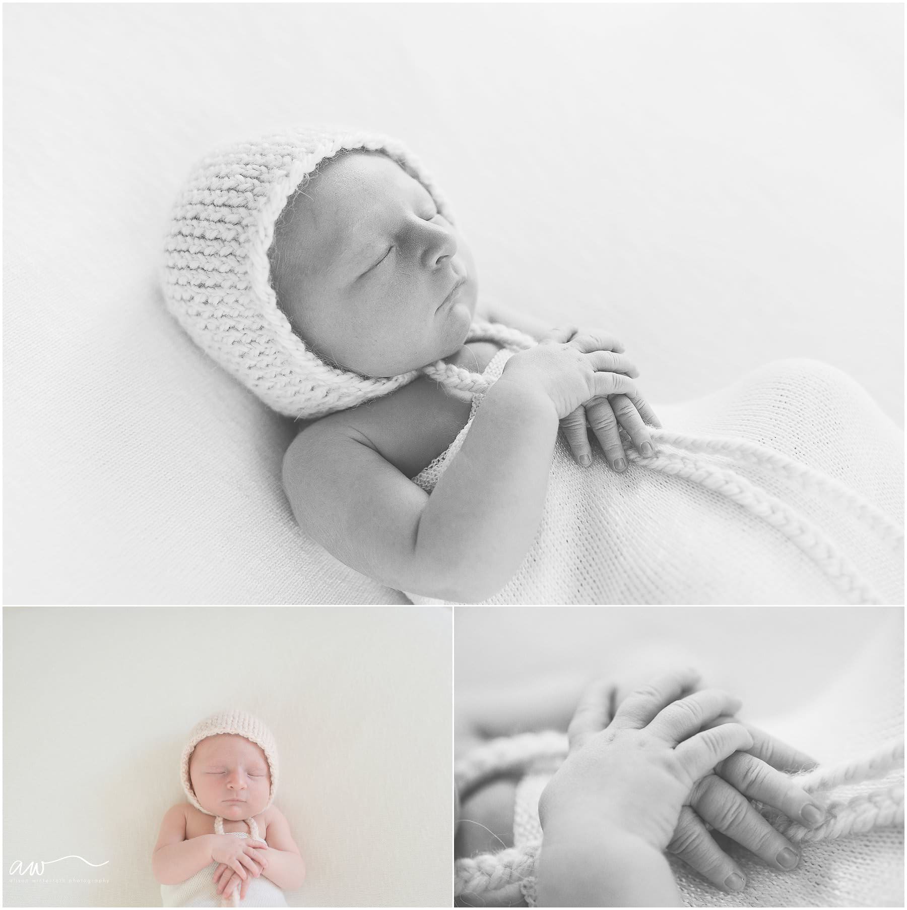 St. pete newborn baby wearing a pink bonnet.