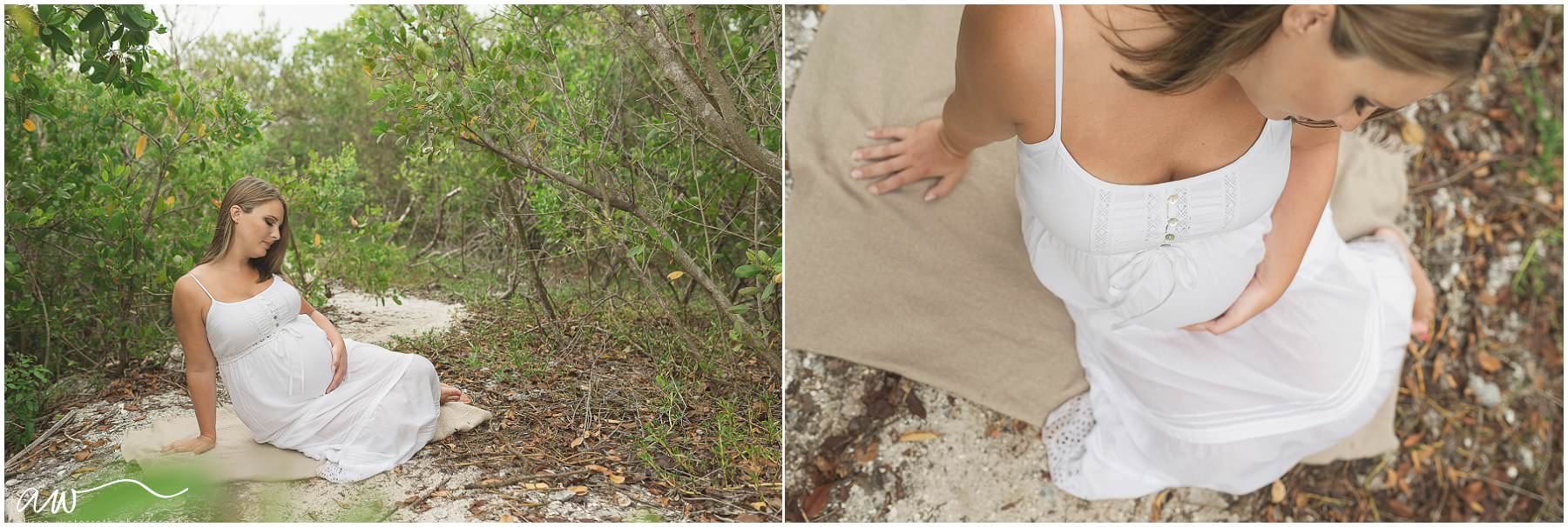 Maternity pictures of a mom in a white dress.