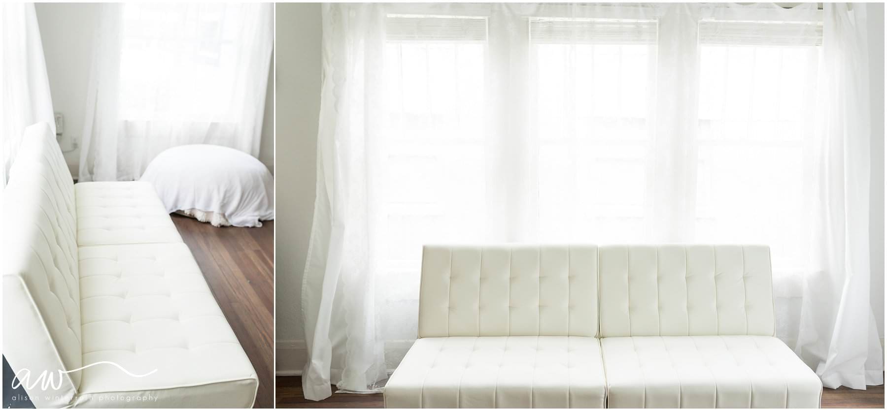 A back lit white couch and newborn beanbag