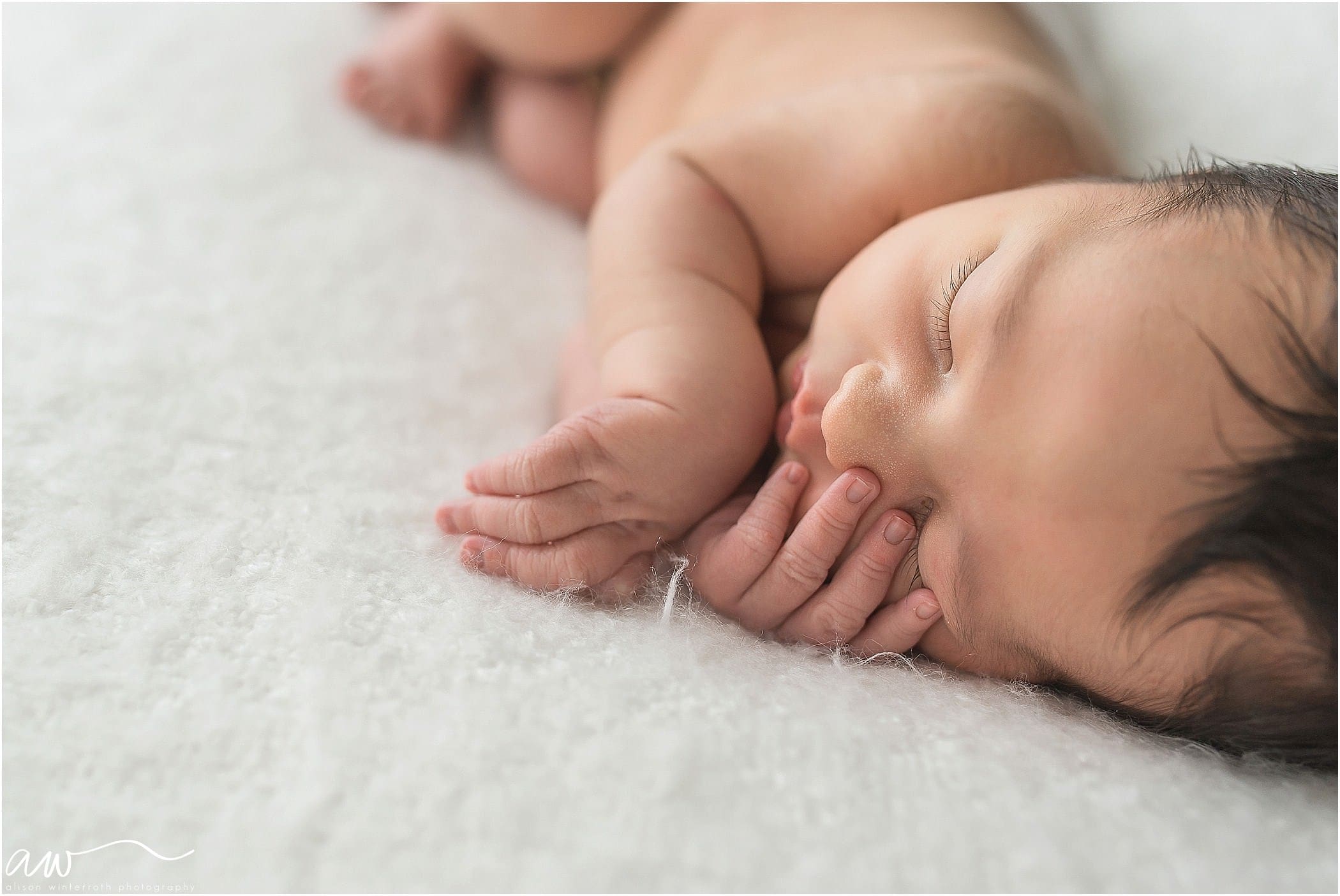 A close up photo of a baby boy