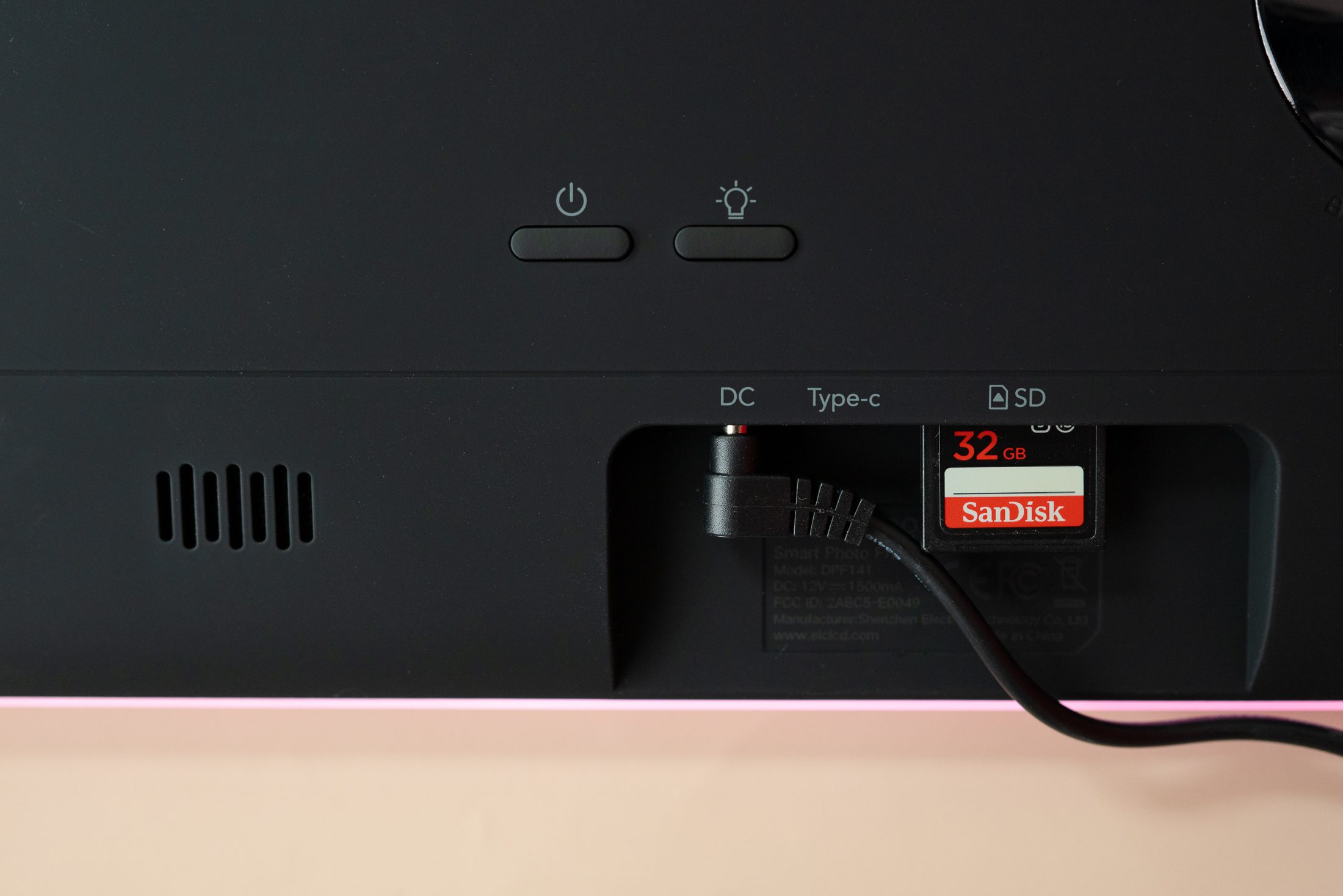 32 gb SD card in the back of the Neon digital photoframe