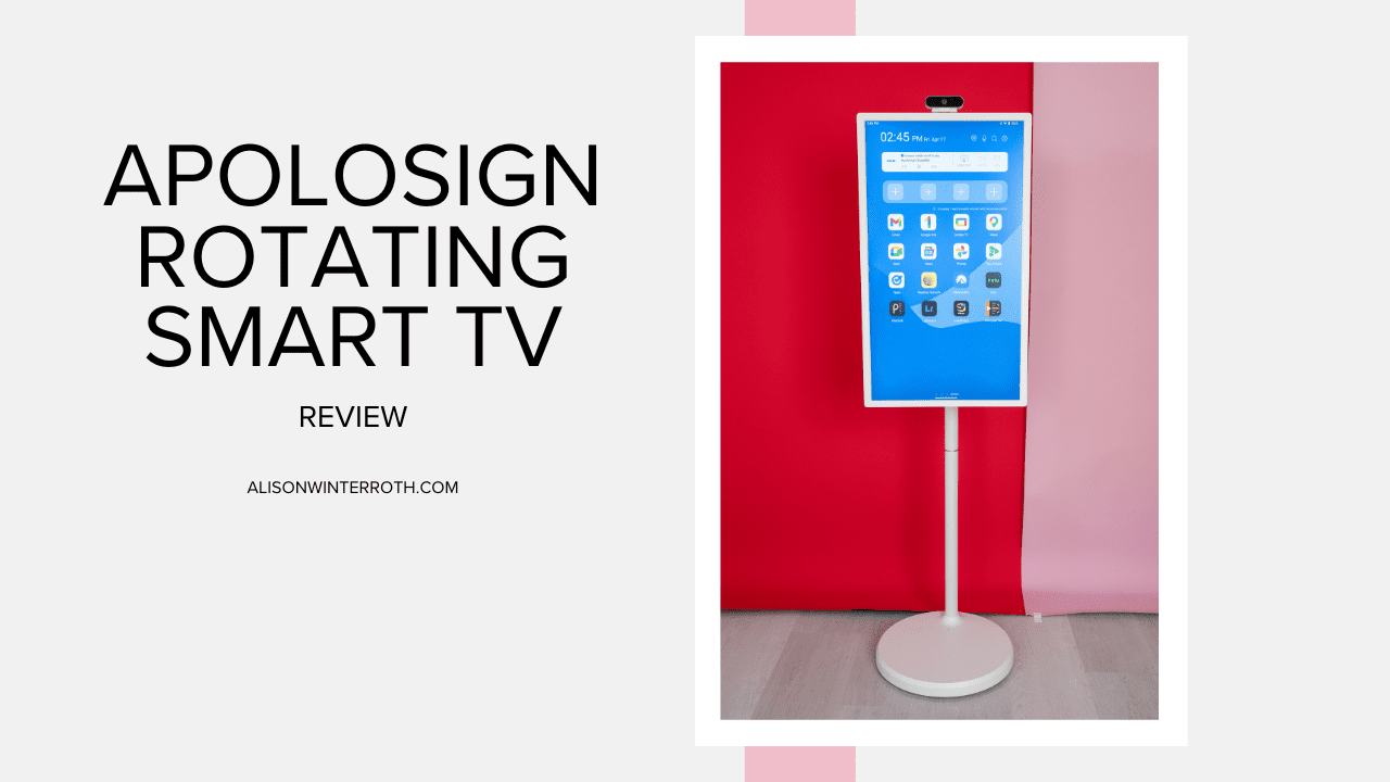 A photo of the apolosign rotating smart tv stand in front of a pink backdrop
